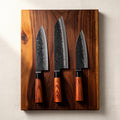 3 BROWN FORGED KNIVES with CUTTING BOARD